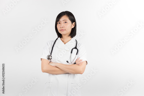 Young asian nurse with a stethoscope isolated over white background.