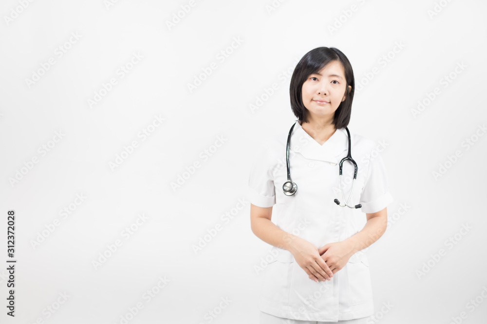 Young asian nurse with a stethoscope isolated over white background. Young asian nurse with a stethoscope isolated over white background.
