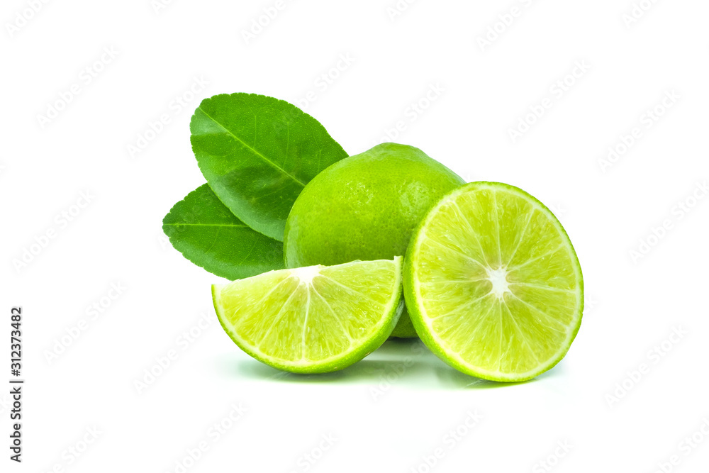 Close-up of Fresh whole limes with slices and leaves isolated on white background with clipping path. Close-up of Fresh whole limes with slices and leaves isolated on white background with clipping path.