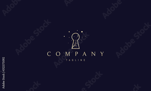 Vector golden logo on which an abstract image of a keyhole inside which is a tree and stars.