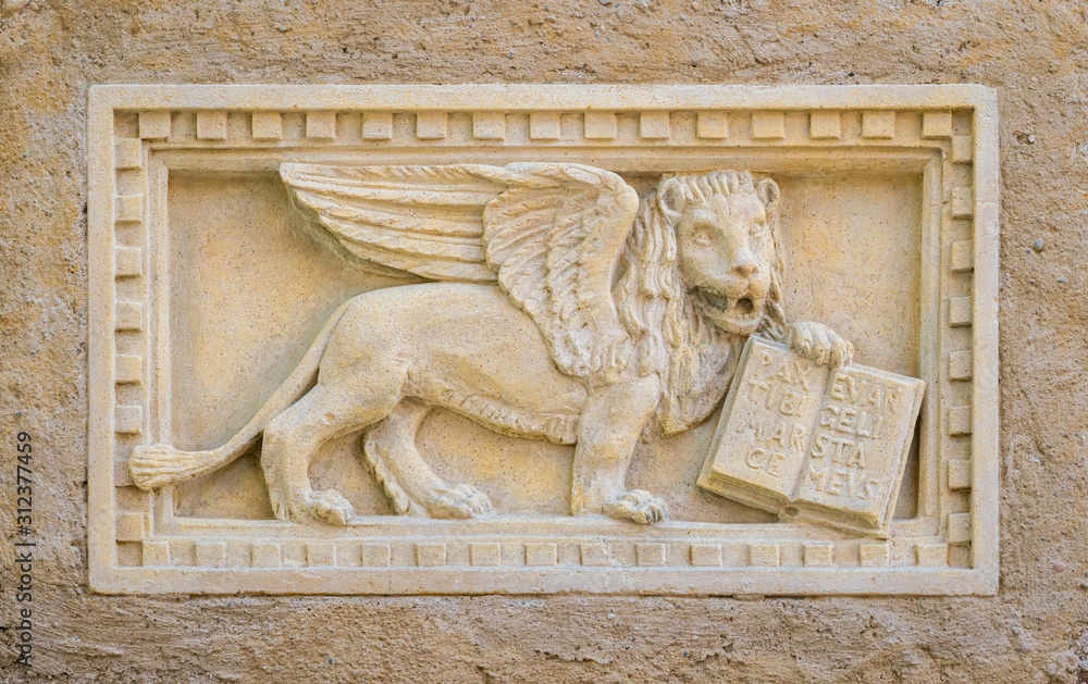 Lion of Saint Mark, symbol of the Serenissima Republic, in the town of Lazise on Lake Garda. Province of Verona, Veneto, Italy.