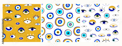 Set of three seamless patterns. Evil eyes. Hand drawn various talismans. Different shapes. Flat design. Free hand drawing style. Contemporary modern trendy vector illustrations.