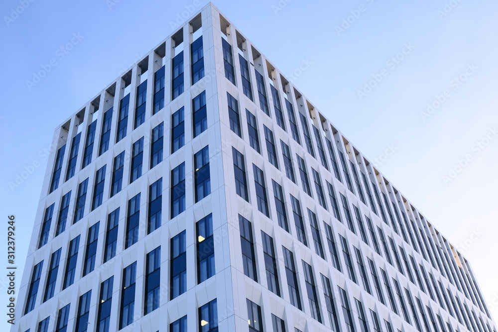 Facade of modern office buildings in a new contemporary business center. Facade of modern office buildings in a new contemporary business center.