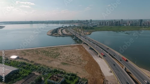 Wallpaper Mural Aerial - summer urban scene of Kazan, Russia. Waterside cityscape with traffic on Millennium Bridge across the river Torontodigital.ca
