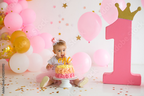 little girl with birthday cake