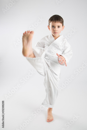 A little boy with a karate kimono