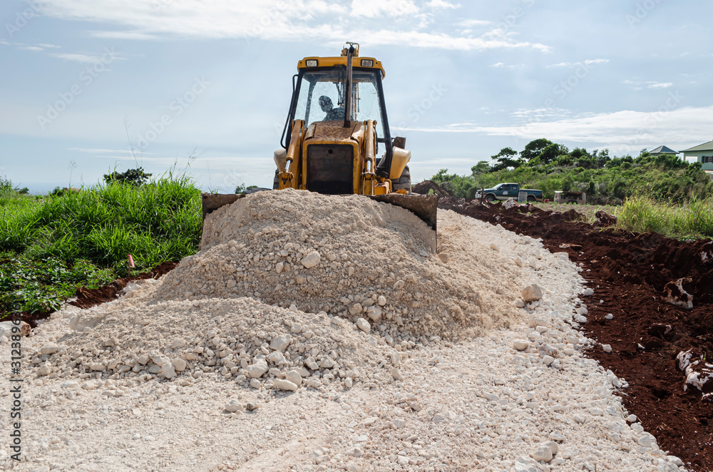 Using Front End Bucket To Spread Marl On New Road Using Front End Bucket To Spread Marl On New Road