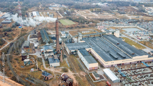 Aerial view smoking chimney of the gas boiler plant. Ecological problem.