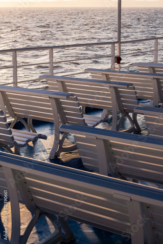 Wallpaper Mural Rows of benches on passenger boat traveling the Greek Islands. Torontodigital.ca