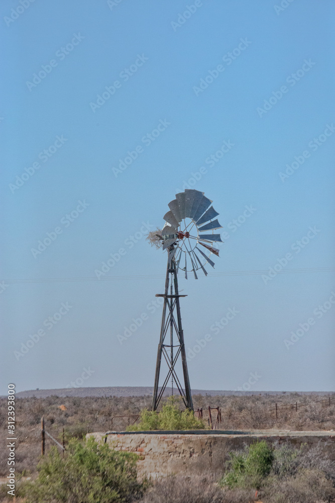 Windmill in the Karoo desert in South Africa Windmill in the Karoo desert in South Africa