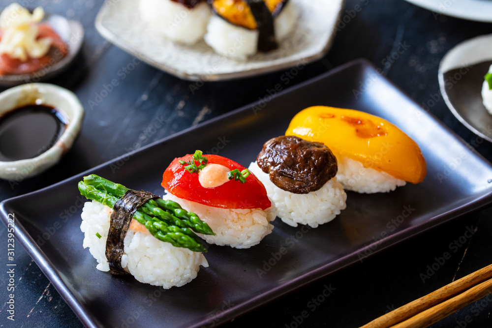 Vegan sushi with tomato, mushroom and asparagus Vegan sushi with tomato, mushroom and asparagus