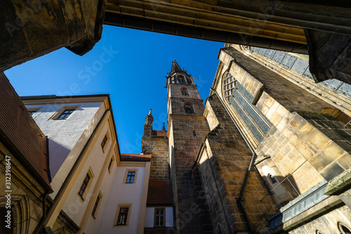 Meissen. Germany. Courtyard of the castle Albrechtsburg and spiers of Meissen Cathedral or the Church of St. John and St. Donatus. photo