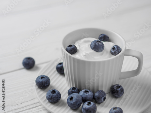 Blueberries in white sour cream