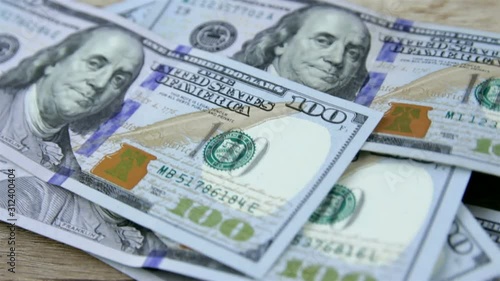 Wallpaper Mural Close up video footage of counting dollar cash on the table. Torontodigital.ca