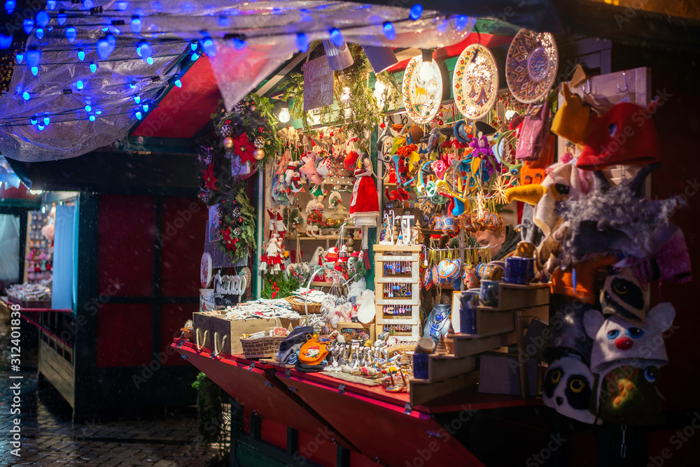 Stand with sweets at Christmas Market . Advent Fair Decoration and Stalls with Crafts Items on the Bazaar.