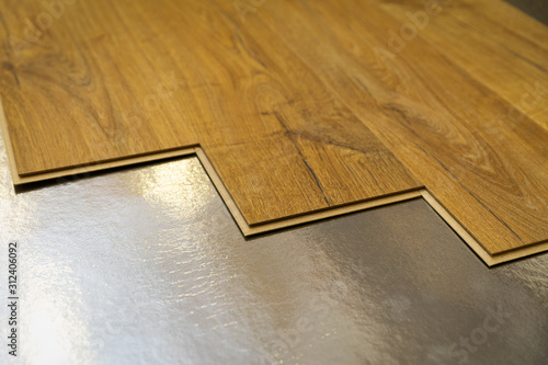 Fotografie flooring - laminate floor installation on foil underlay