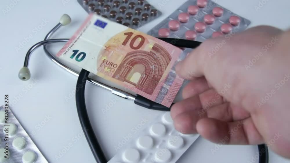 Health care, pharmaceutical and medical industry business concept - stethoscope and tablet pills on Euro banknotes. Health care, pharmaceutical and medical industry business concept - stethoscope and tablet pills on Euro banknotes.