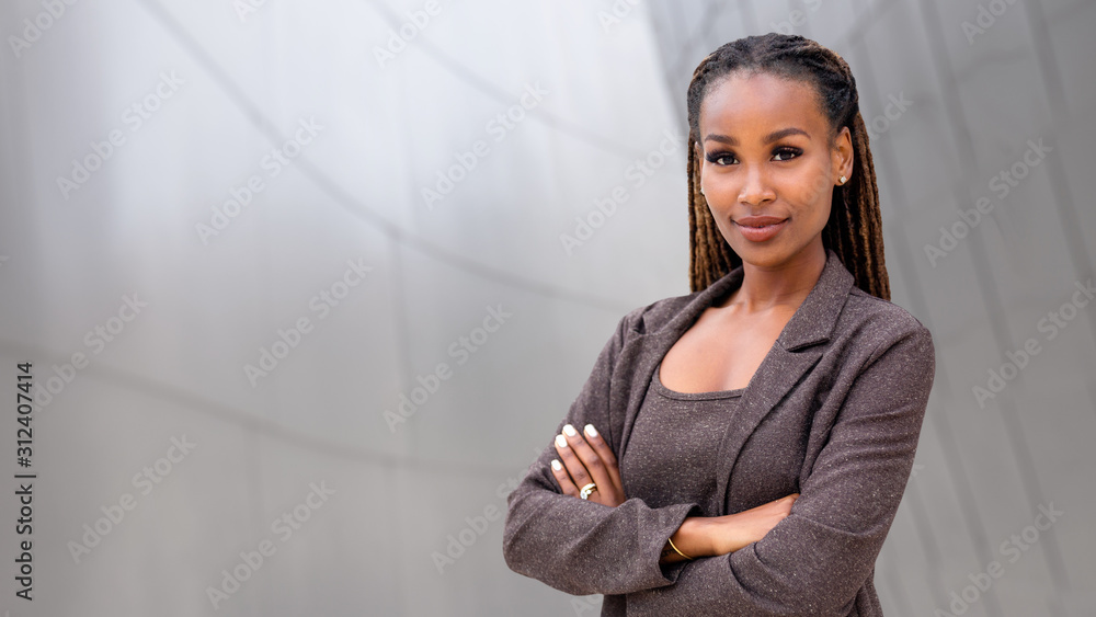 Banner of African American female company leader CEO boss executive standing confident with ambition and pride, at financial  - obrazy, fototapety, plakaty 