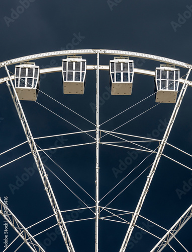 Ferris wheel attraction side view photo