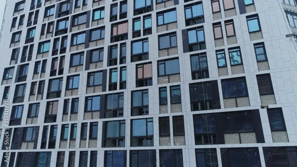 Aerial video. Colorful windows of a new residential skyscraper. Aerial video. Colorful windows of a new residential skyscraper.