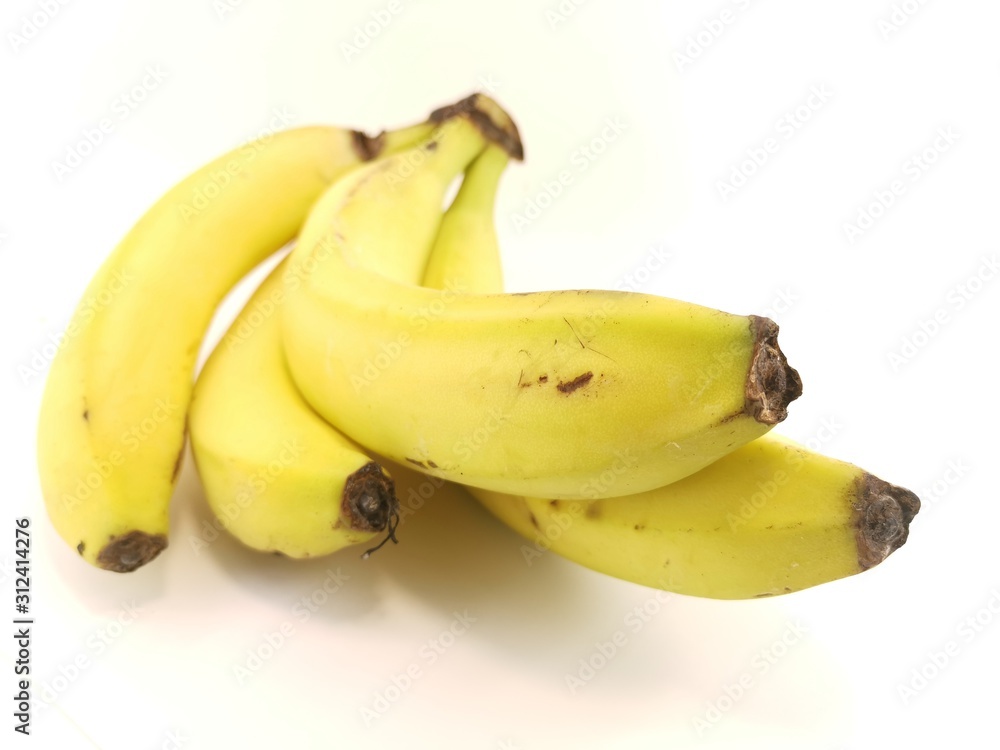 ripe yellow bananas on a white background