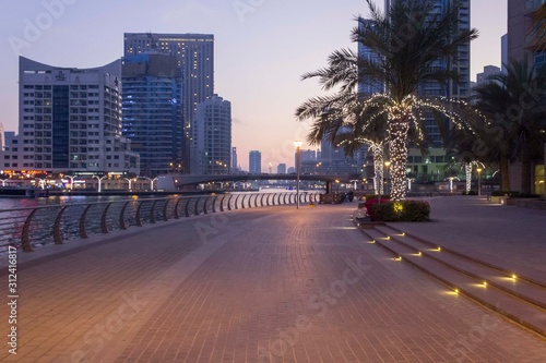 Dubai Marina promenade at sunset time © greta gabaglio