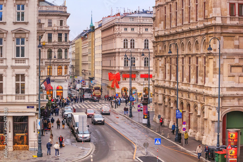 Festive city landscape - view of the streets next to the Vienna State Opera on Christmas eve, Austria