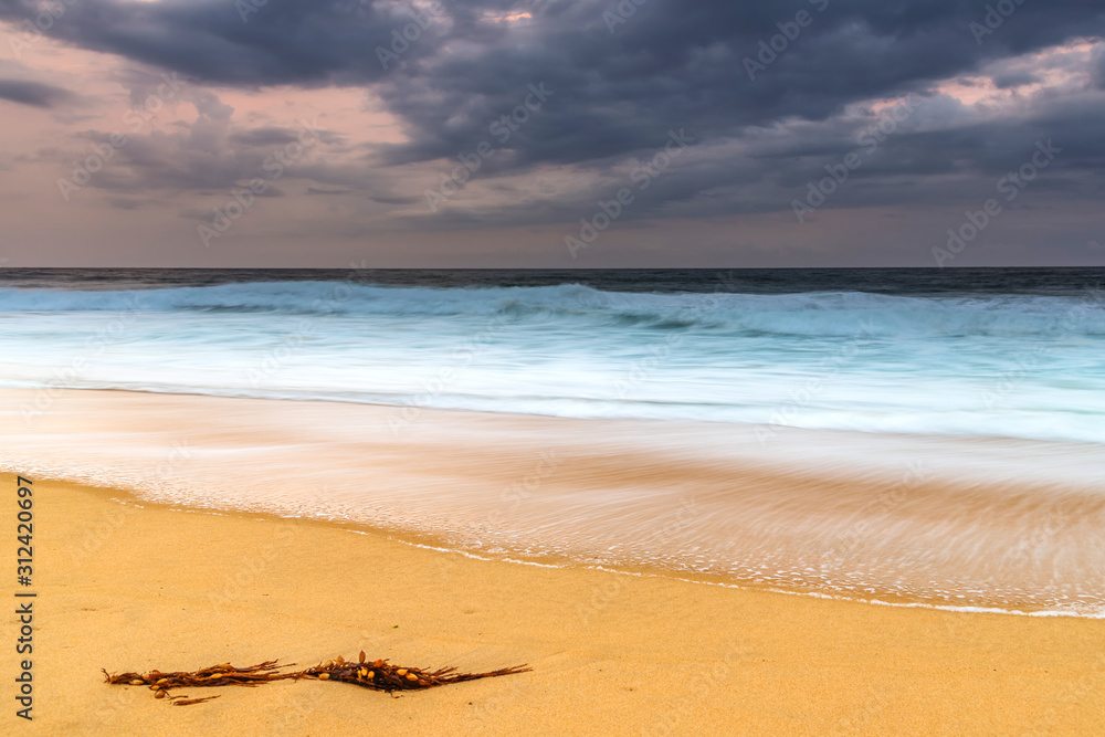 Fototapeta premium Rain Clouds and Early Morning Seascape