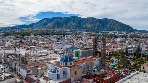 Tepic city center in State Nayarit in Mexico. Aerial drone view of Tepic and San Juan mountain.	 photo