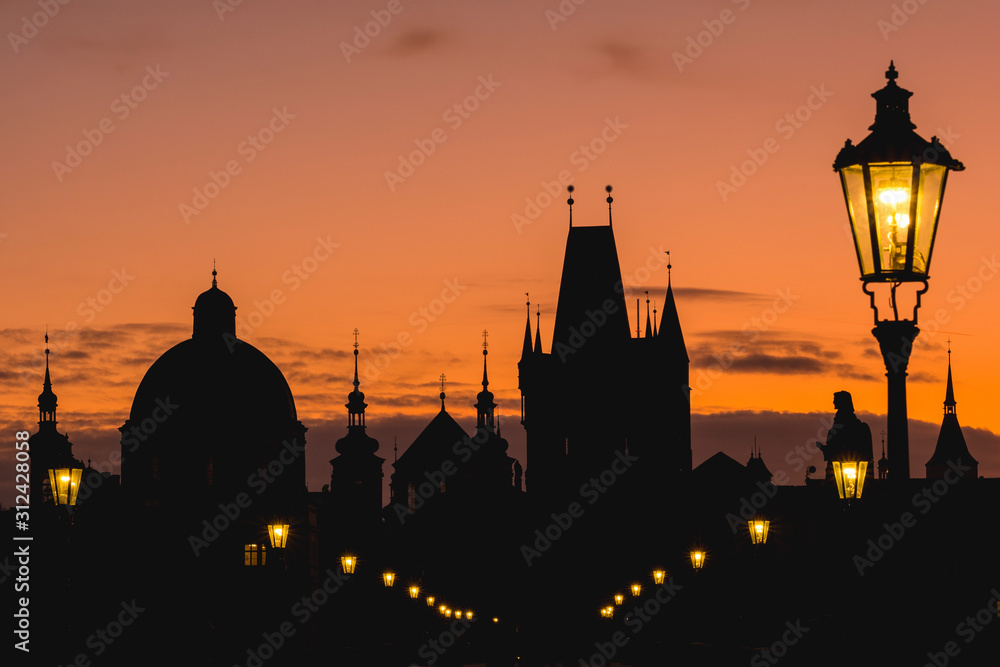 Silhouettes of towers and spires during sunrise in Prague, Czeck Republic