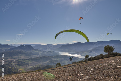 man doing paragliding in Lija Cadiz photo