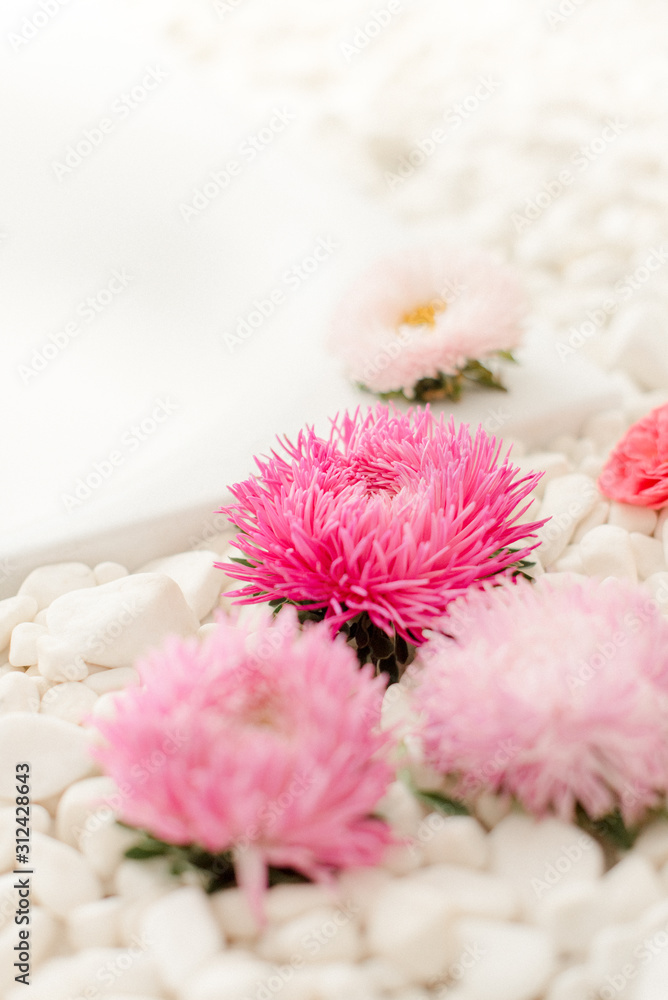 Fototapeta premium Flowers near the bath