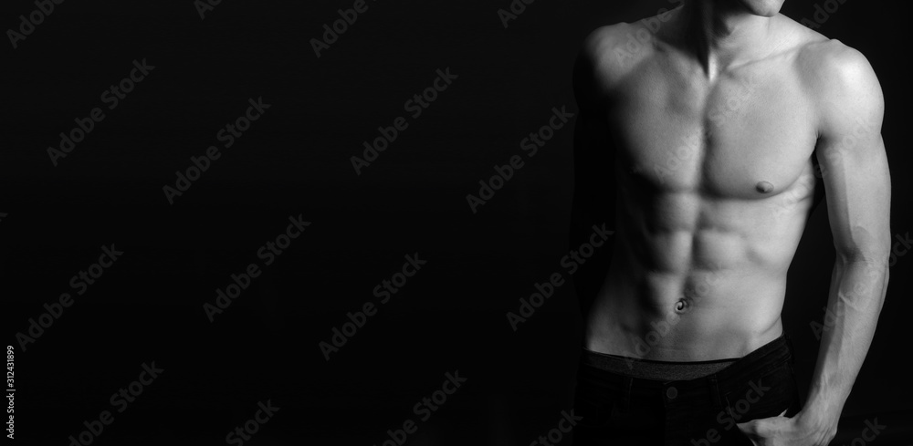 Muscular fit male body , black and white photo 