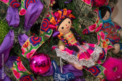  Christmas tree with traditional Mexican decorations  rag dolls  traditional colored ribbons of Mexican culture