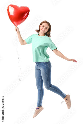 Jumping young woman with he...