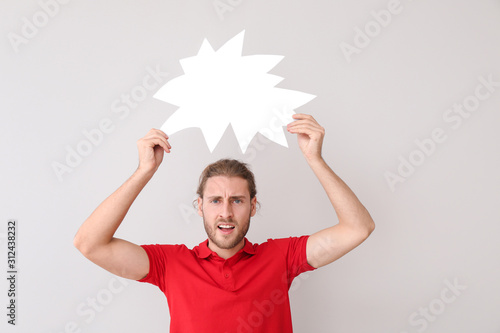 Indignant man with blank sp...