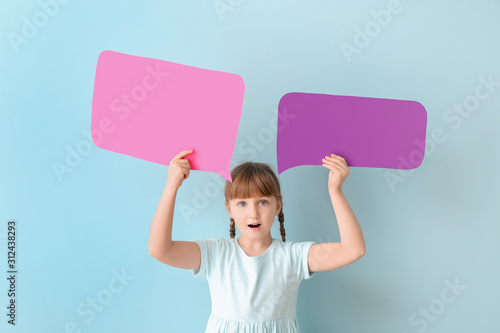 Surprised little girl with ...