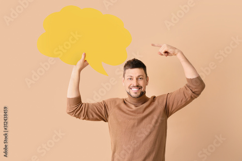 Man with blank speech bubbl...