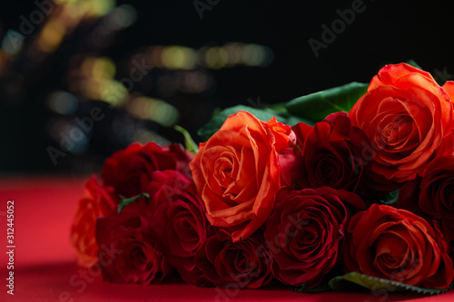 Abstraction  background and texture for Happy Valentine s Day congratulations. Love and romance  a bouquet of roses on a background of salutes in bokeh.