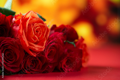 Red roses on a red background  Love and romance. Holiday