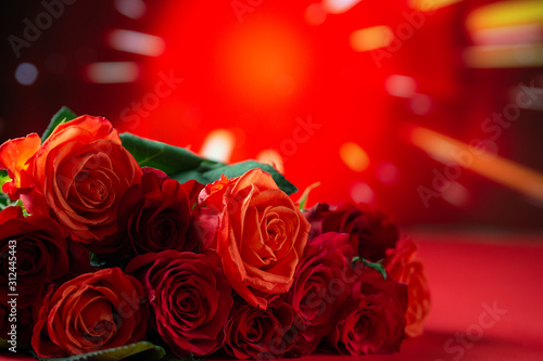 Red roses with a red background  congratulations on Valentine s Day  happy birthday  or happy love day. Romance  postcard