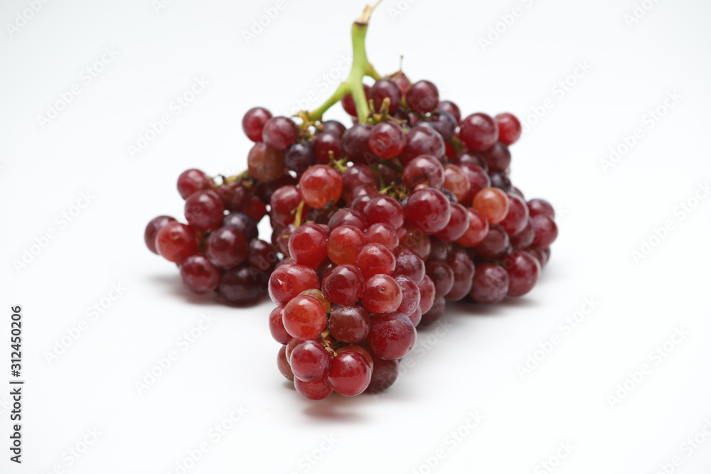 Selective focus red grape on white background