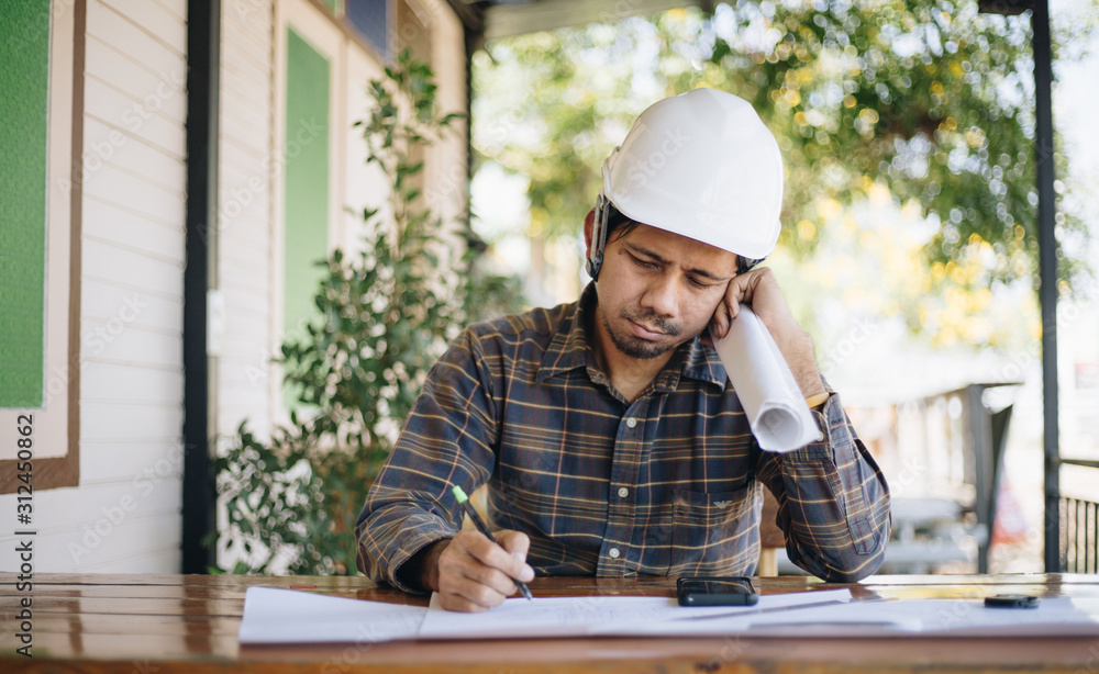 Architect asian man sleeping while working Architect asian man sleeping while working