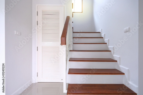 Slika na platnu brown wooden stair and white wall in residential house