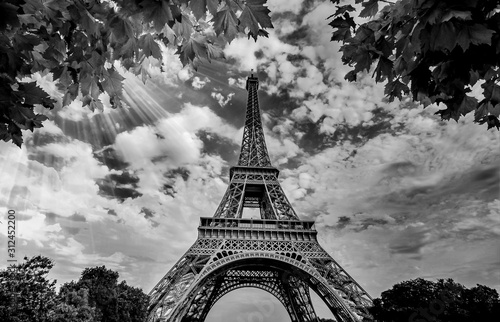 Eiffel Tower in Paris France with Golden Light Rays. Black and White Photography