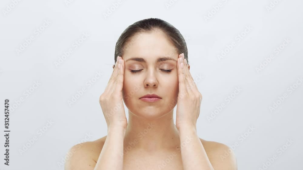 Studio portrait of young, beautiful and natural blond woman applying skin care cream. Face lifting, cosmetics and make-up. Studio portrait of young, beautiful and natural blond woman applying skin care cream. Face lifting, cosmetics and make-up.