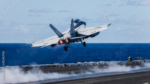 USS Ronald Reagan operates off the coast of Rockhampton, Australia during Exercise Talisman Sabre.  A F/A-18 Super Hornet is catapulted off the deck
