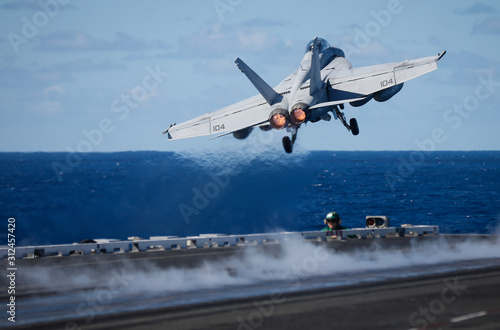 USS Ronald Reagan operates off the coast of Rockhampton, Australia during Exercise Talisman Sabre.  A F/A-18 Super Hornet is catapulted off the deck