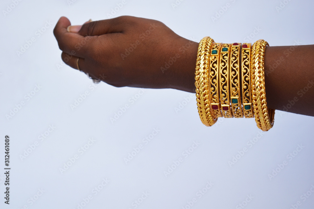 hand, isolated, wedding, finger, gold, bangle, handshake, female, people,  jewelry, bracelet, sign, bride, gold, woman, jewelry, agreement, concept,  chain, wrist, person, fingers, symbol, love, India, Stock Photo | Adobe  Stock