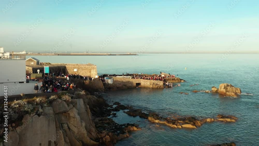Forty Foot, Christmas Swim, Sandycove, Ireland, Drone Low Push Forward Forty Foot, Christmas Swim, Sandycove, Ireland, Drone Low Push Forward